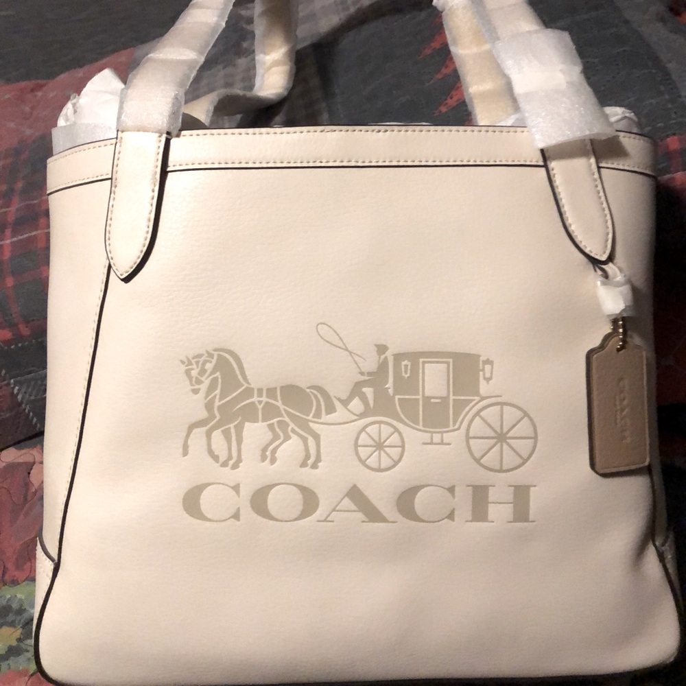 Brand new coach never used just a little to big for my liking